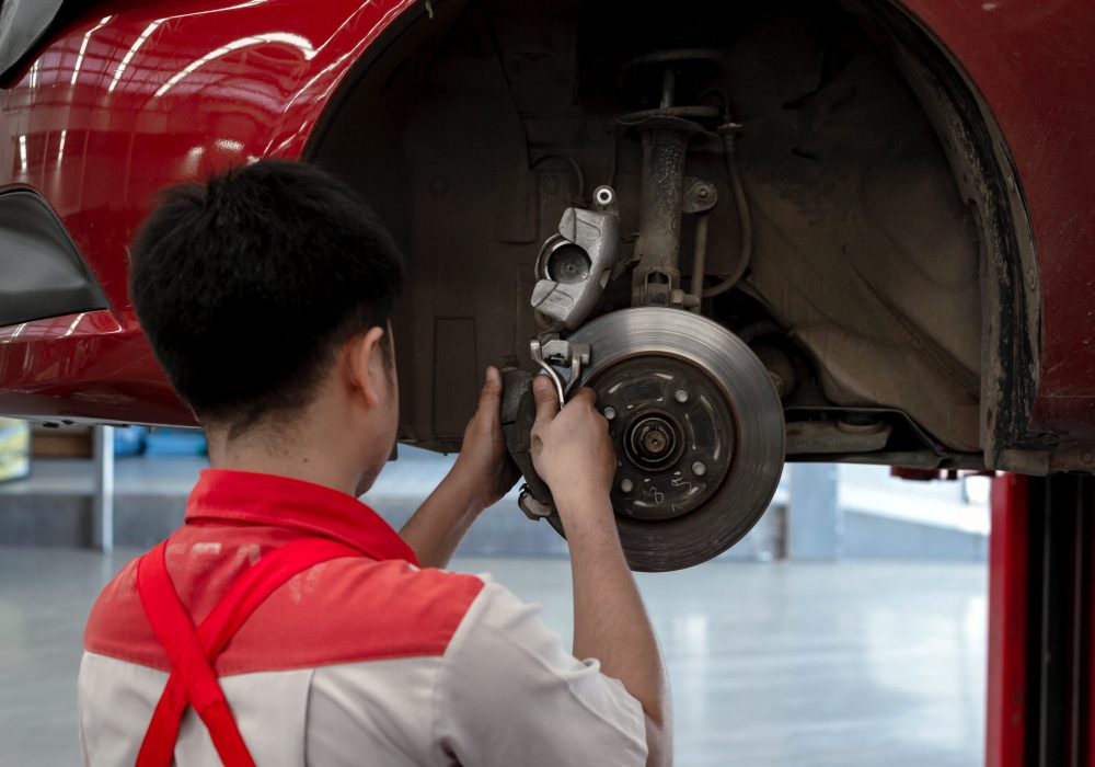 mechanic-working-car-maintenance